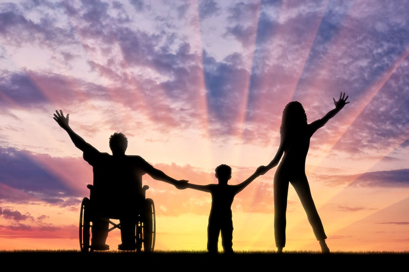 Family Holding hands enjoying the sunset. Member Benefits Header Image